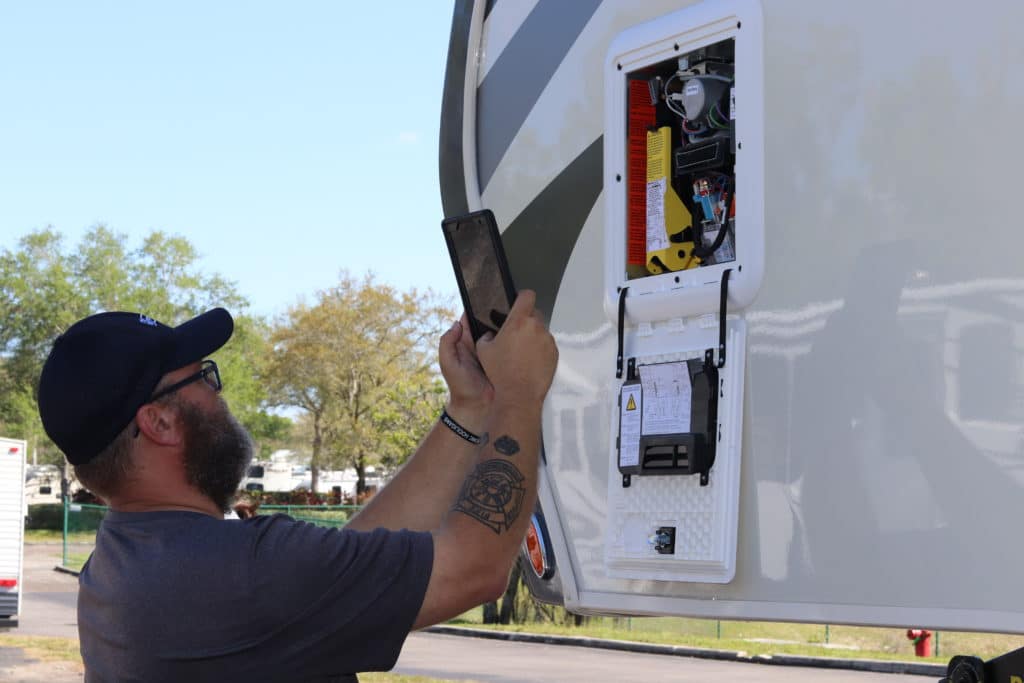 Master certified RV inspector Jason Carletti uses HomeGauge Companion app to inspect a brand new fifth wheel